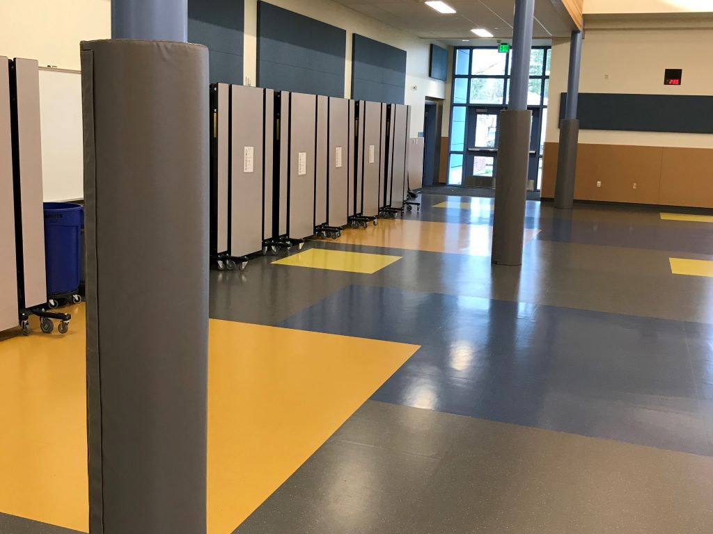 School cafeteria grey safety pole covers