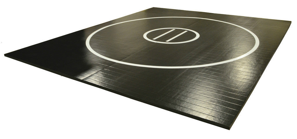 Wholesale priced wrestling mat for sale. Black mat with white circles. AK Athletic Equipment wrestling/mixed martial arts mat product. Made in America.