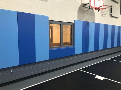 Alternating blues basketball padding for detention center