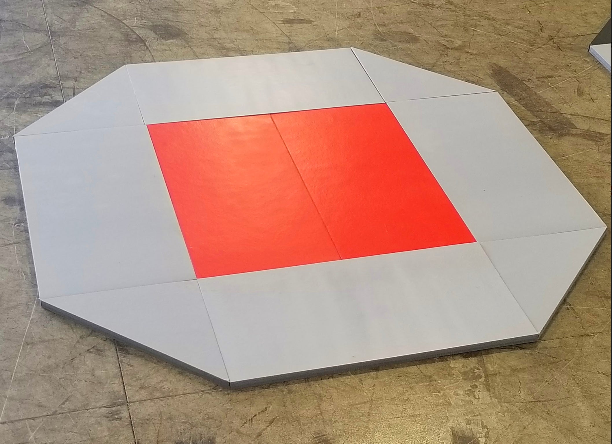 Remnant Octagon Wrestling mat Gray and Red Vinyl 8' x 8' x 1 ⅜"