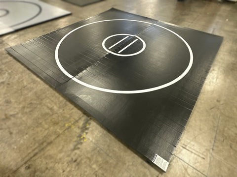 Clearance 12' x 12' x 1 3/8" Roll-Up Wrestling Mat - Black Mat with White Circles and Lines