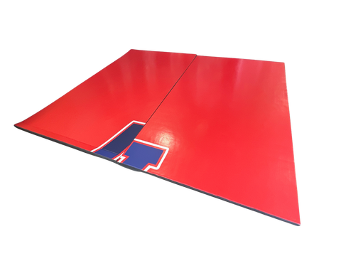Clearance 10' x 135" x 1 3/8" Roll-Up Wrestling Mat - Red Mat with Logo Remnant