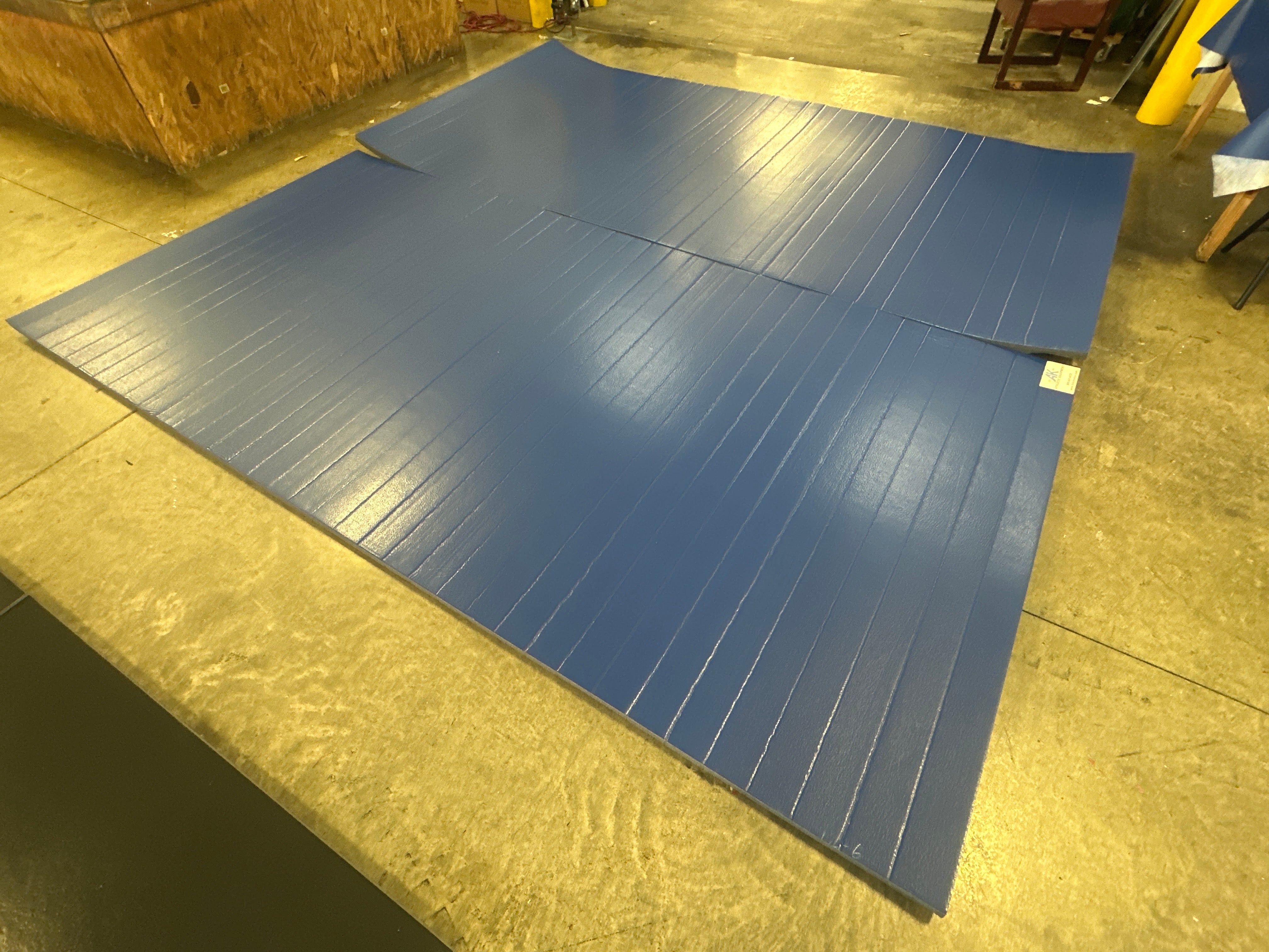 Clearance 12' x 12' x 1 3/8" Roll-Up Wrestling Mat - Blue Mat with No Circles or Lines