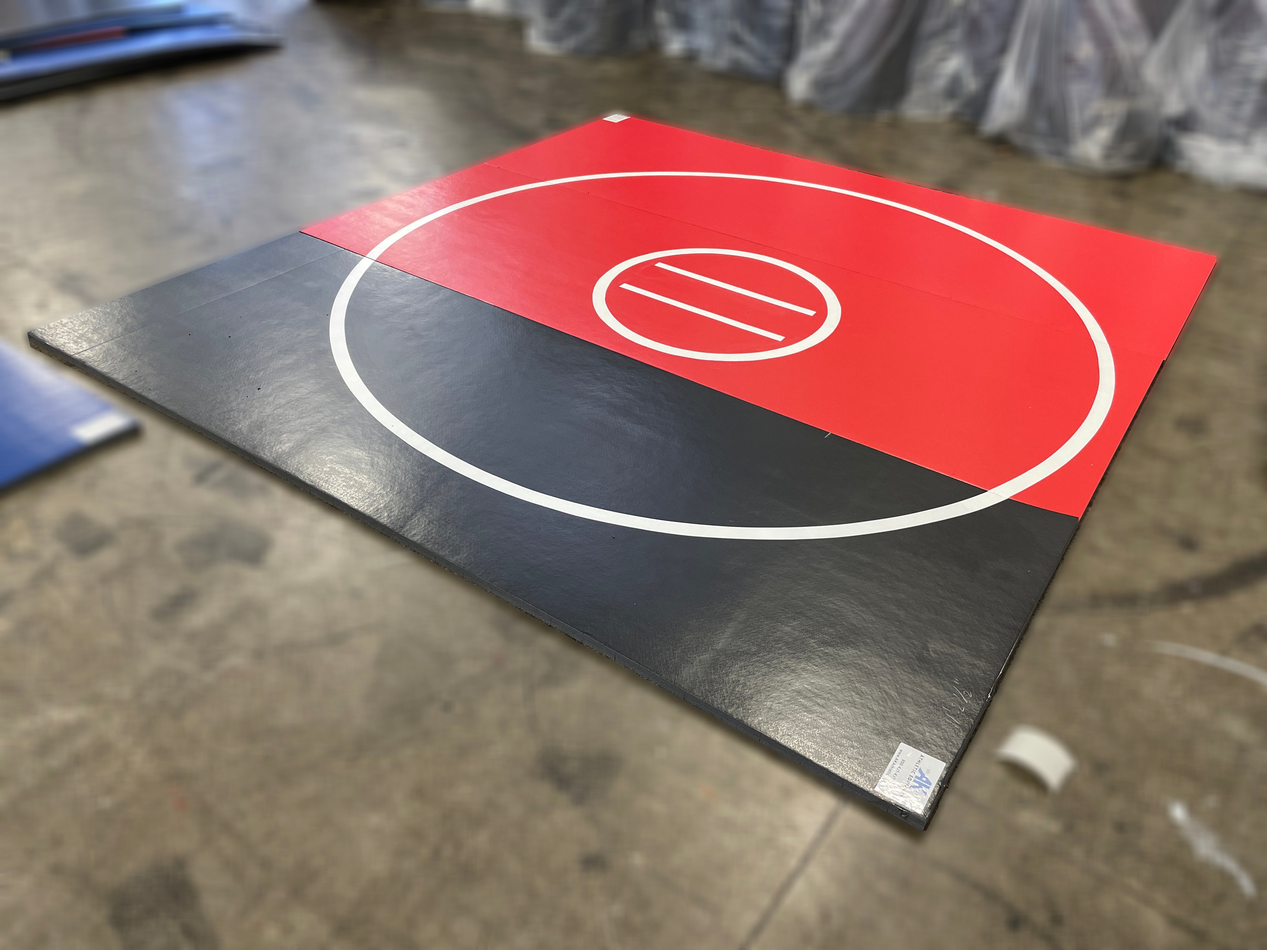 Clearance 12' x 134.5” red and black with white circles roll up mat