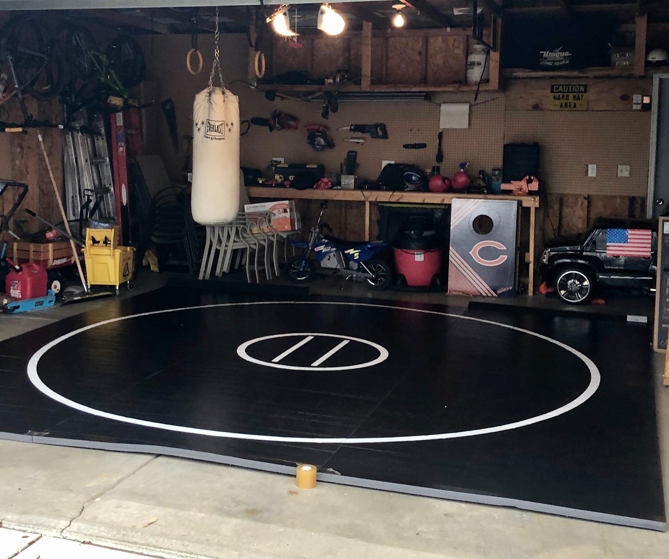 Black wrestling mat in boxing garage
