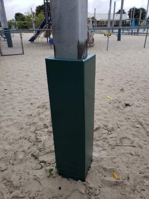 Outdoor green safety column pad for a playground 