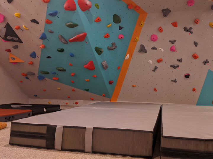 Home climbing wall grey crash pads 