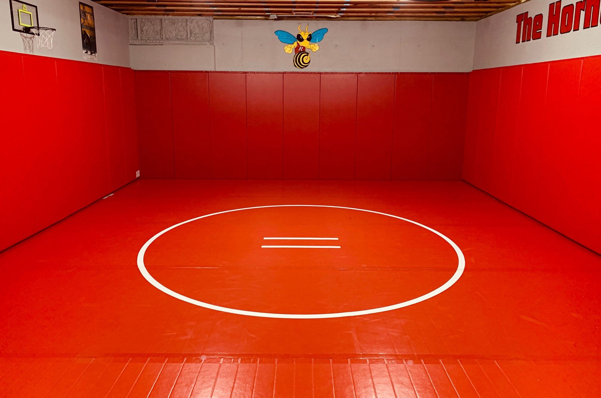 Red Wrestling Room. Wrestling mat and wall padding combination. Customize your home gym.