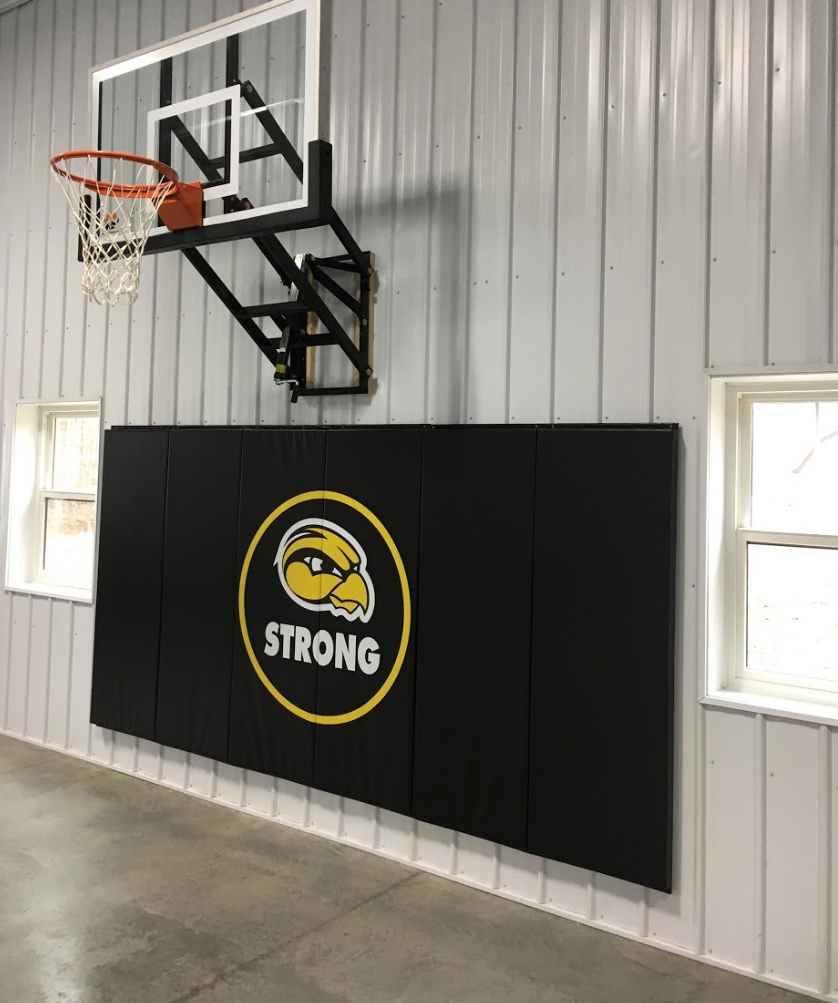 AK Athletics Logo on School Gym Wall Padding