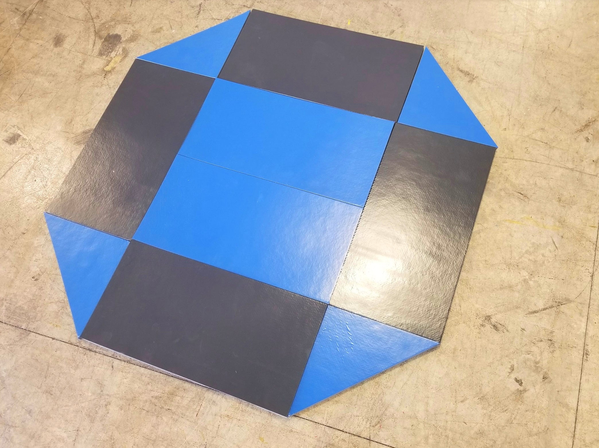 8' x 8' remnant octagon wrestling mat Black and Blue
