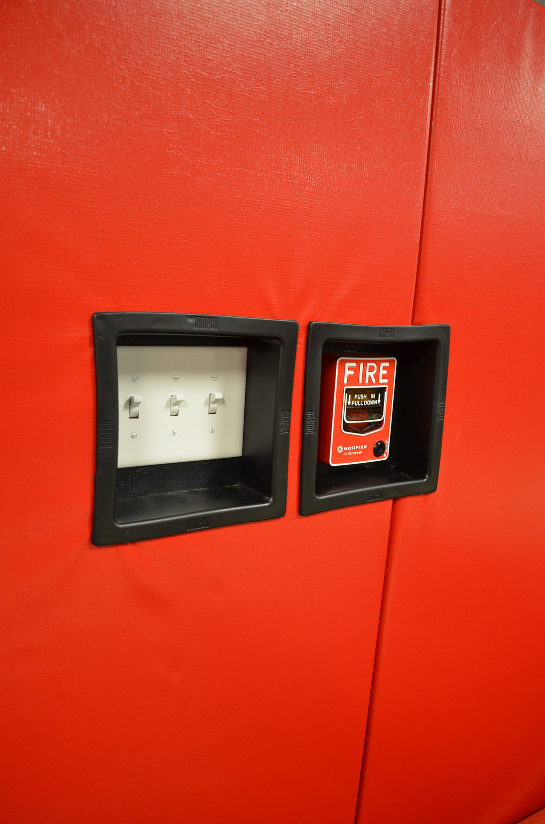 AK Athletics gym wall pad insert for electrical switch